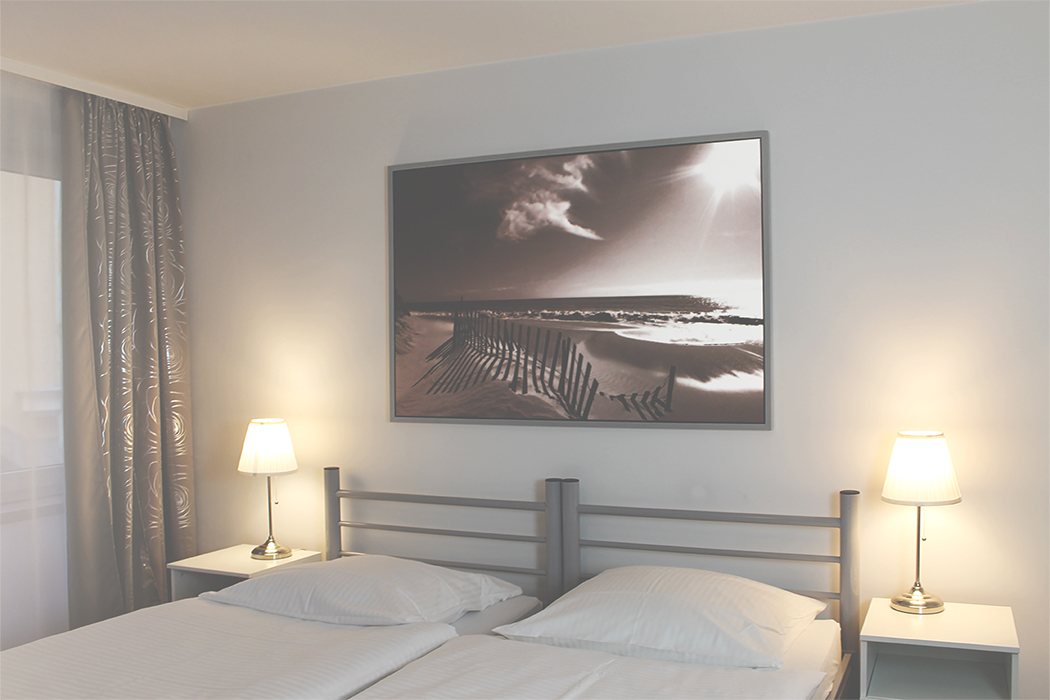 king-size bed and wall picture